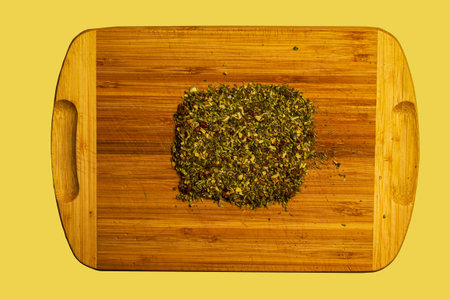 Background of natural green tea with mint, lemon balm, hibiscus and berries. Texture of green tea. Top view, flat lay.の写真素材