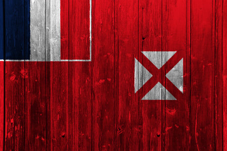 Wallis and Futuna Islands flag on a textured background. concept collage.の写真素材