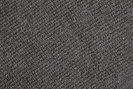 Realistic illustration of Black knitted fabric texture. Abstract modern Knit texture black color. Dark knitted backgroundの写真素材