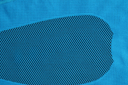 Synthetic fabric texture, blue plaid, beautiful background pattern. Fragment of thermal underwear fabric.の写真素材