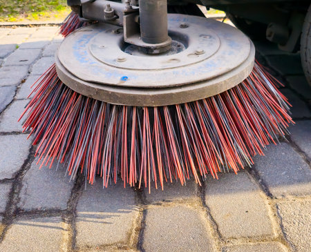 Close-up sweeper machine cleaning. Concept clean streets from debris.の写真素材
