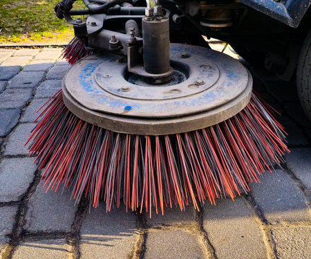 Close-up sweeper machine cleaning. Concept clean streets from debris.の写真素材