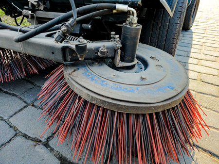 Close-up sweeper machine cleaning. Concept clean streets from debris.の写真素材