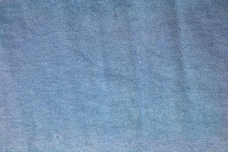 Blue gray fabric texture background. A piece of cotton fabric is carefully laid out on the surface. textile texture.の写真素材