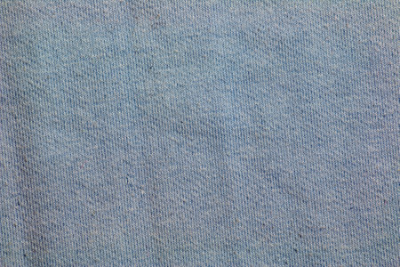 Blue gray fabric texture background. A piece of cotton fabric is carefully laid out on the surface. textile texture.の写真素材