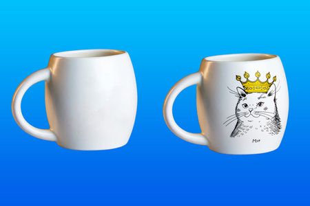 White cup isolate. Drawing of a cat in a crown. Written in Ukrainian Moore. side view. mockup templateの写真素材