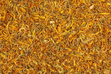 Background of dry herb CALENDULAE FLORES or Marigold petals used in herbal medicine. The concept of herbal treatment. Active ingredient CALENDULA OFFICINALISの写真素材
