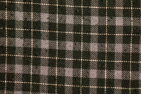 Texture of checkered grey, white wool. Checkered light gray textured fabric background closeupの写真素材