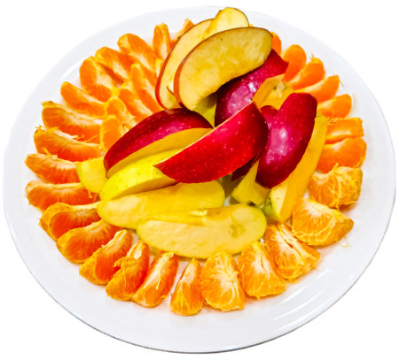 Peeled tangerines sliced and red and yellow apples cut into slices on a white plate. Healthy food concept.の写真素材