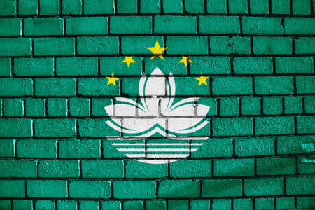 Macau flag on a textured background. concept collage.の写真素材