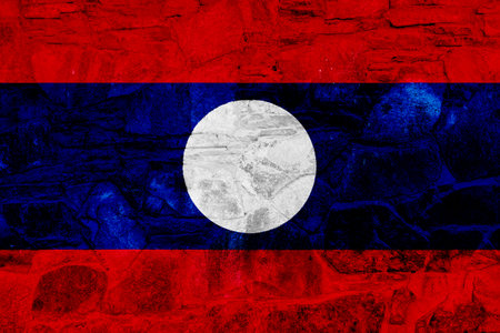Lao People's Democratic Republic flag on a textured background. concept collage.の写真素材