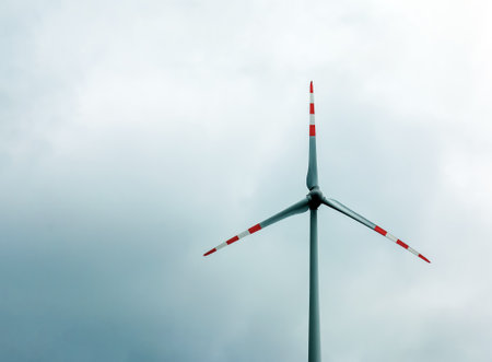 Wind farm or windmill in cloudy weather in Austria in Europe, allows you to get clean energy. It's sustainable, renewable energy for the environmentの写真素材