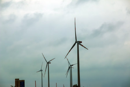 Wind farm or windmill in cloudy weather in Austria in Europe, allows you to get clean energy. It's sustainable, renewable energy for the environmentの写真素材