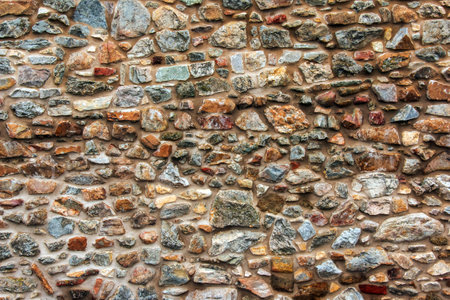 The texture of the stone wall. Background texture of the stone wall of the old castle. Stone wall as background or texture.の写真素材