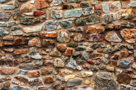 The texture of the stone wall. Background texture of the stone wall of the old castle. Stone wall as background or texture.の写真素材