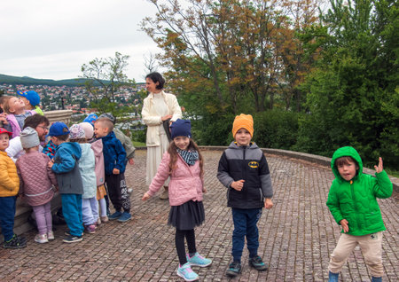 Slovakia, Nitra - 05.18.2023: A group of schoolchildren with teachers on an excursion in Nitrograd.のeditorial素材