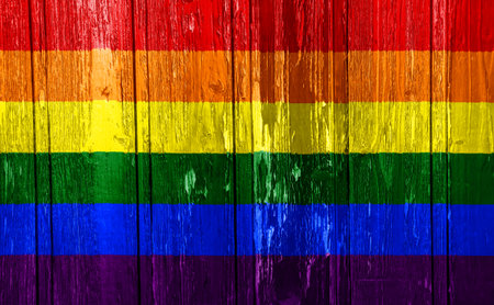 Flag of the LGBT community on the background of the wooden texture of the boards. Rainbow gay culture symbol. concept collage. Illustration symbol of pride.の写真素材