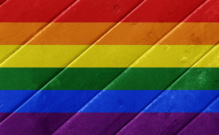 Flag of the LGBT community on the background of the wooden texture of the boards. Rainbow gay culture symbol. concept collage. Illustration symbol of pride.の写真素材