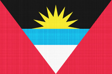 Flag of Antigua and Barbuda on a textured background. concept collage.の写真素材