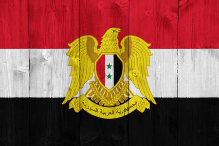 Flag of Syrian Arab Republic on a textured background. concept collage.の写真素材