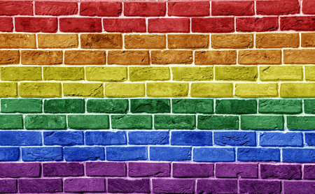 Flag of the LGBT community on the background of a stone wall. Rainbow symbol of gay culture. concept collage. Illustration symbol of pride.の写真素材