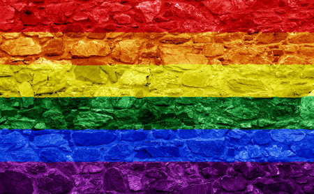 Flag of the LGBT community on the background of a stone wall. Rainbow symbol of gay culture. concept collage. Illustration symbol of pride.の写真素材
