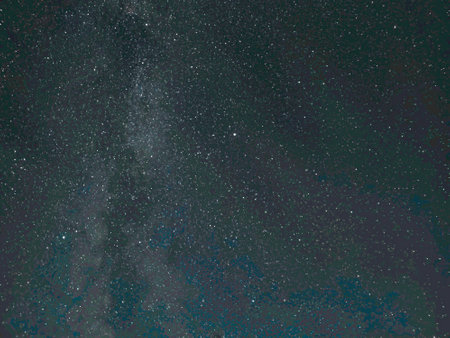 Astrophoto taken with the Galaxy S23 Ultra. The starry sky and the Milky Way galaxy are visible in the countryside at night.の写真素材