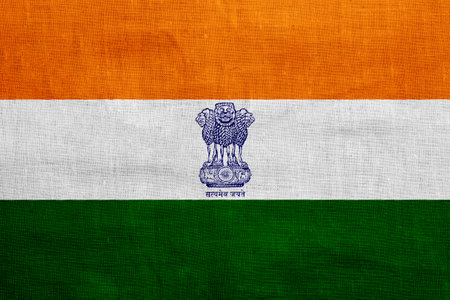 Flag and coat of arms of the REPUBLIC OF INDIA on a textured background. concept collage.の写真素材
