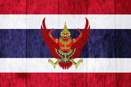 Flag and coat of arms of the Kingdom of Thailand on a textured background. concept collage.の写真素材