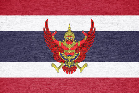 Flag and coat of arms of the Kingdom of Thailand on a textured background. concept collage.の写真素材