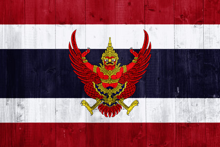 Flag and coat of arms of the Kingdom of Thailand on a textured background. concept collage.の写真素材