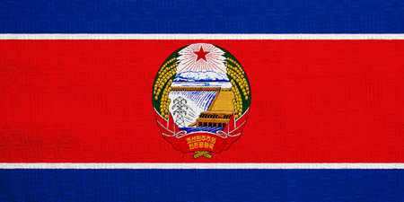 Flag of Democratic People's Republic of Korea or North Korea on a textured background. concept collage.の写真素材