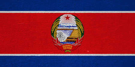 Flag of Democratic People's Republic of Korea or North Korea on a textured background. concept collage.の写真素材