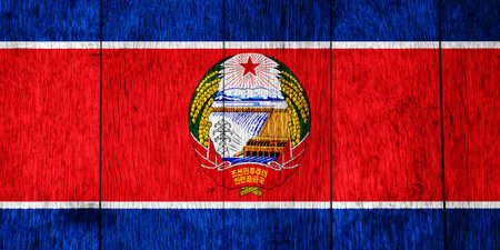 Flag of Democratic People's Republic of Korea or North Korea on a textured background. concept collage.の写真素材
