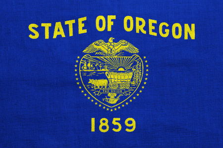 Flag of USA state Oregon on a textured background. concept collage.の写真素材