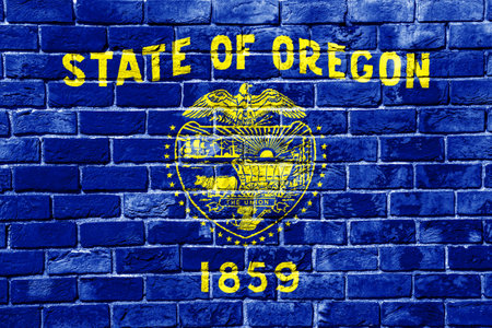 Flag of USA state Oregon on a textured background. concept collage.の写真素材