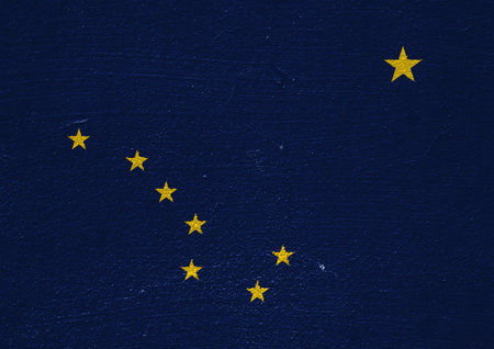 Flag of USA state Alaska on a textured background. concept collage.の写真素材