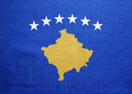Flag of Republic of Kosovo on a textured background. concept collage.の写真素材