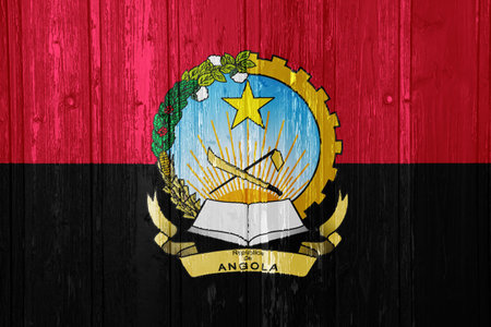 Flag and coat of arms of Republic of Angola on a textured background. concept collage.の写真素材