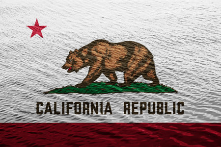 Flag of USA state California on a textured background. concept collage.の写真素材
