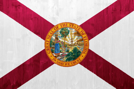 Flag of USA state Florida on a textured background. concept collage.の写真素材