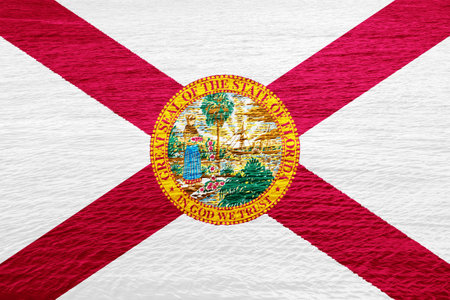 Flag of USA state Florida on a textured background. concept collage.の写真素材
