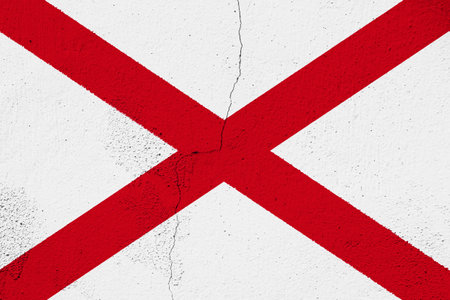Flag of USA state Alabama on a textured background. concept collage.の写真素材