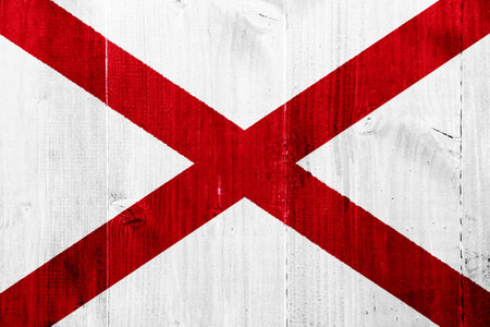 Flag of USA state Alabama on a textured background. concept collage.の写真素材