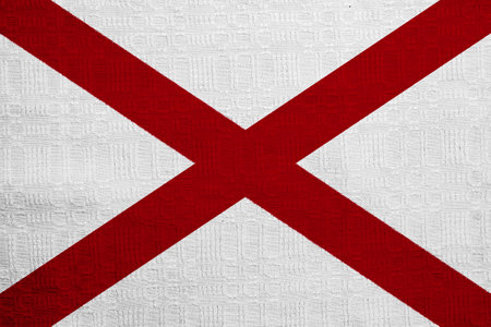 Flag of USA state Alabama on a textured background. concept collage.の写真素材