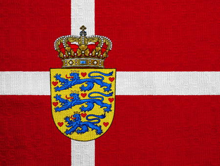Flag and coat of arms of Denmark on a textured background. concept collage.の写真素材