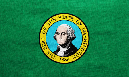 Flag of US state of Washington on a textured background. Concept collage.の写真素材