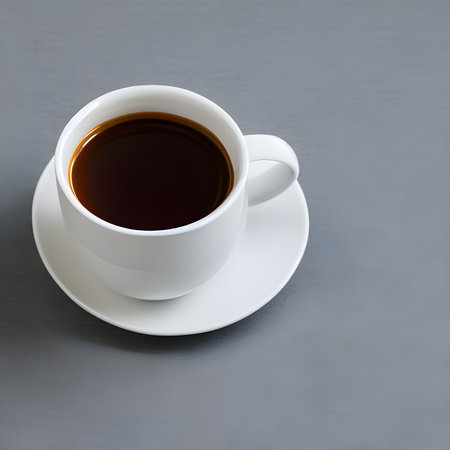 White cup isolated on a gray background. The image was created using generative AI.の素材
