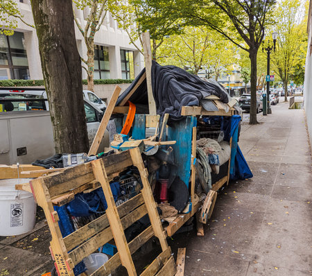 Portland, Oregon, USA - 03/10/2023: Homeless mobile home with belongings and utensils on the streets of Portland, Oregonのeditorial素材