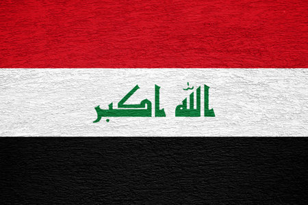 Flag of Republic of Iraq on a textured background. Concept collage.の写真素材
